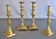 Dos Pares de candeleros de bronce dorados. Alto: 25 y 21 cm. - 59 y 314