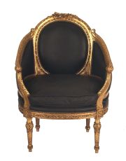 Sillon estilo Luis XVI, dorado tapizado cuero negro. Faltante