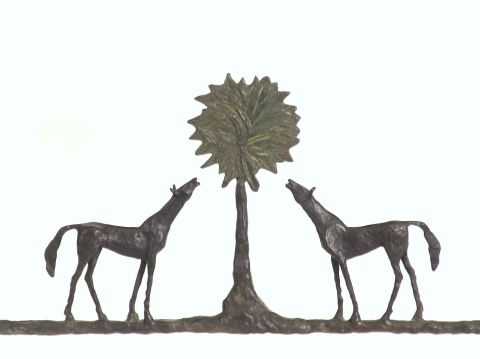 Giacometti, Consola de bronce patinado. Tapa de marmol.