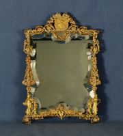 Espejo de mesa, marco bronce con medallón de joven.
