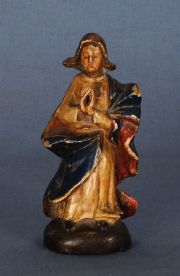 Virgen orando, talla de madera pintada.