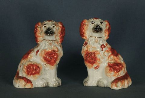 Perros de porcelana manchas brique.