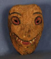 Mascara Chane, zoomorfa, de palo borracho, h: 25 cm. Hacia 1930/40
