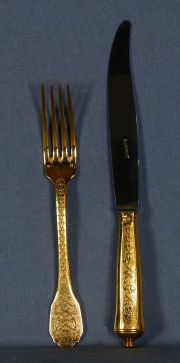 Puiforcat, conjunto de 24 cubiertos (12 cuchillos y 12 tenedores) de plata vermeille.