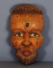 Mascara madera tallada decoración de ojo en la frente.