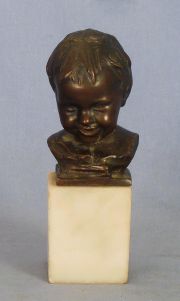 Ballestrieri. Cabeza de Niño, pequeña escultura de bronce. Fda.