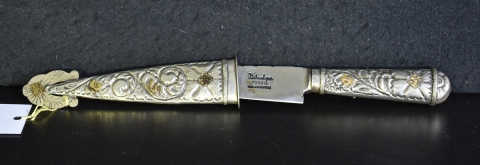 Cuchillo con dorados,de metal, decoración de rameados