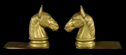 Apreta libro de bronce con forma de cabeza de caballo