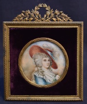 Mujer de sombrero rojo, miniatura enmarcada en bronce