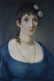 V. Usdin, Mujer con rosas, óleo sobre tela. Mide: 59 x 49 cm.