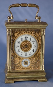 Reloj de viaje francés caja de bronce. A.Santini. Con asa. 19 cm. (436)