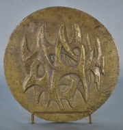 Nieto 'Abstracto', relieve cicular de bronce.