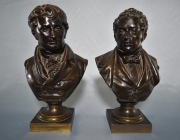 PERSONAJES ILUSTRES, dos esculturas de petit bronce. 33 cm.