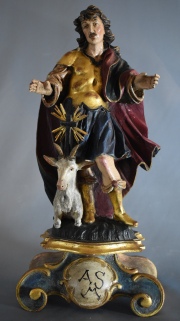 San Miguel. Talla en madera policromada. Figura del santo a sus pies figura de un