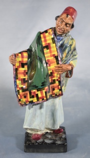 Carpet Seller, figura Royal Doulton. Alto 23 cm.