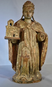 San Agustín sosteniendo una iglesia en la mano. Talla en madera policromada. (Falta la mano). 33 cm. Desperfectos.
