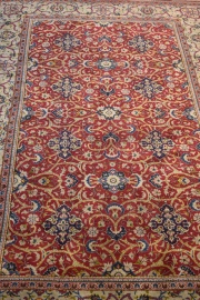 Alfombra persa de lana, campo rojo 217 x 135 cm.