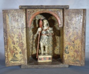 SAN JUAN BAUTISTA, figura de madera tallada y policromada. Contenida en tabernáculo.Alto santo: 27 cm. Alto tab: 33 cm.