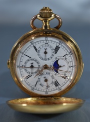 Reloj de bolsillo DUBOIS de oro. Fase lunar, triple calendario. Diám.: 5,9 cm. Peso total: 149 gr.