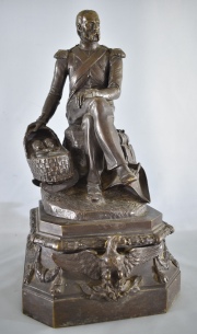 Gechter, escultura en bronce. Falta espada. 'Militar junto a canasta con Mellizos'. 41.5 cm.
