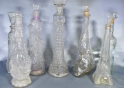 Colección de 18 Botellones distintos: Torre Eiffel, manos, barco, faro, etc. Falta 1 tapón.