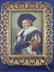 Retrato de caballero de gran bigote. Marco bronce dorado firmado. M Poggesi. Mide: 11 x 8 cm.