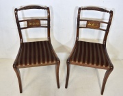 Cuatro sillas y dos sillones, estilo Regency, tapizado a bastones. 6 Piezas