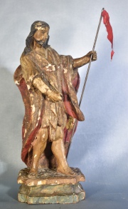 San Juan Bautista, talla de madera policromada. Saltaduras. Alto: 22 cm.