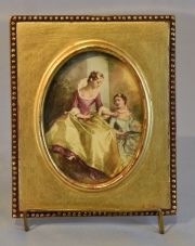 Miniatura lámina Mujer, marco dorado. Marco mide: 12 x 10 cm.