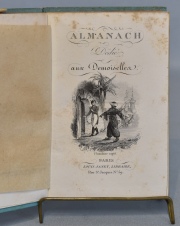Almanach Dedie Aux Demoiselles.Editorial: Louis Janet. Encuadernado en cartón turquesa con dorados. 1 vol.