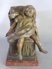 Niña dormida, escultura en petit bronce. Firmada A. Bousaud. Alto: 21 cm.